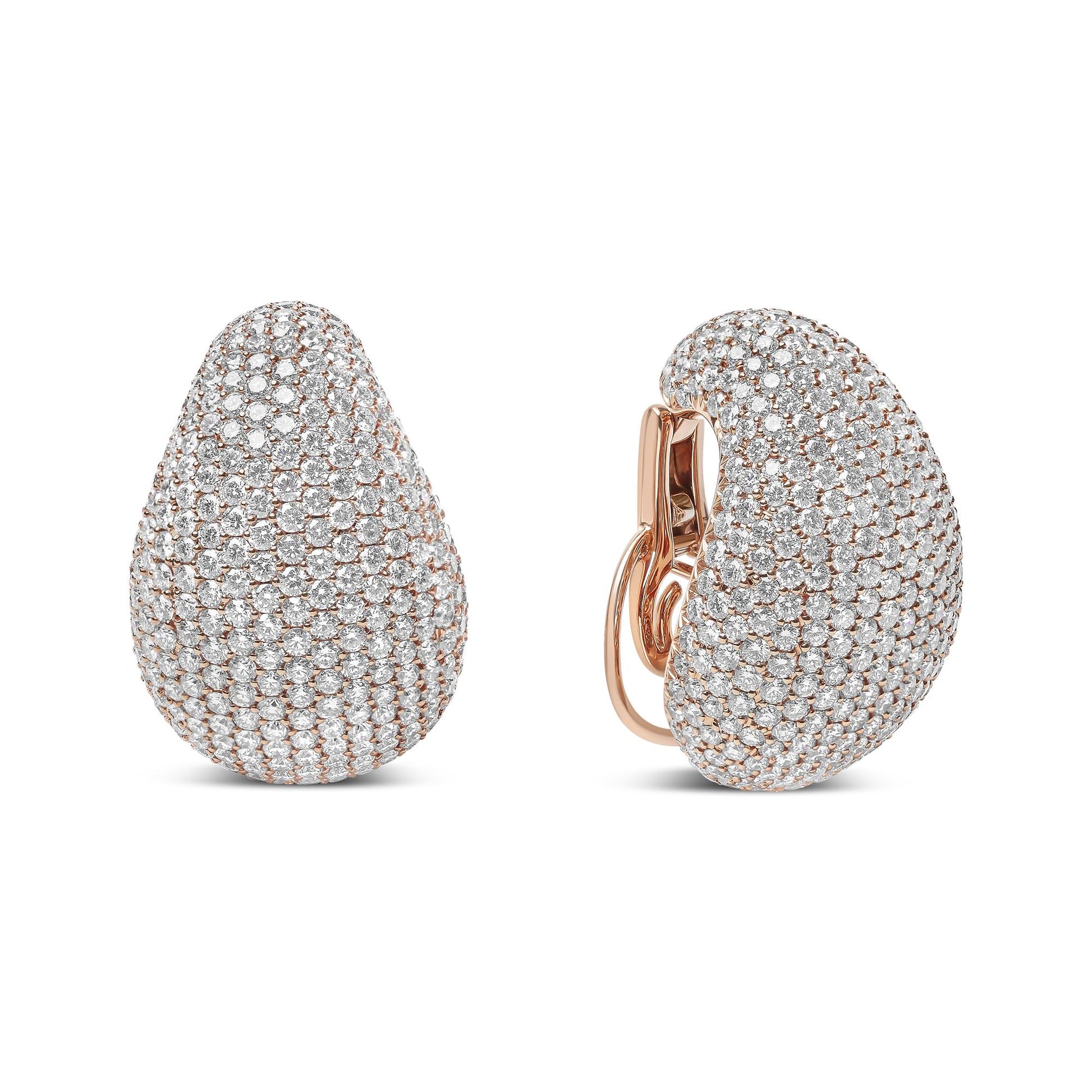 Pair of rose metal earrings with a rounded, teardrop shape fully covered in pave set white gemstones, shown from front and side angles on a white background.