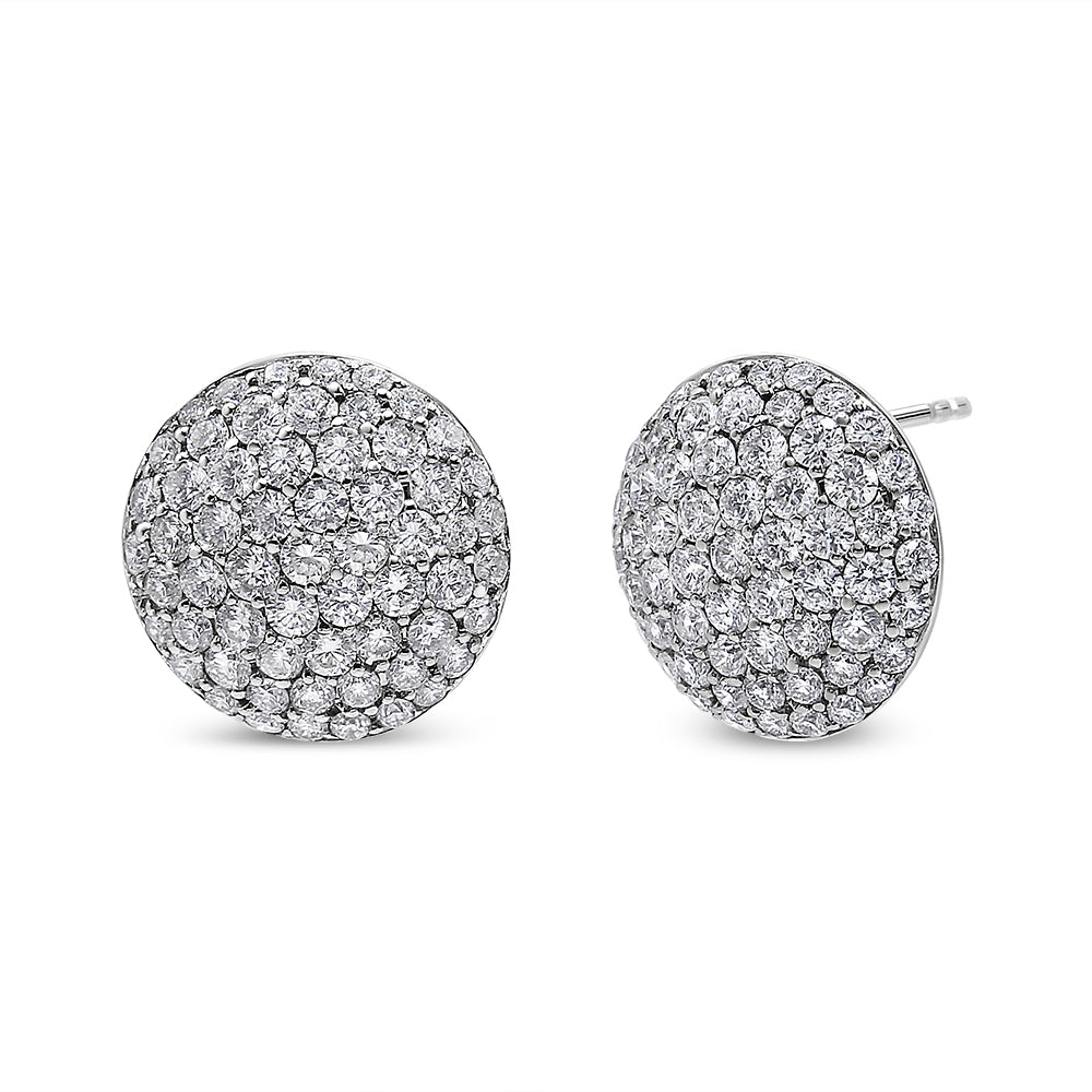 Pair of round white metal stud earrings completely covered with multiple small white gemstones, shown from a slightly angled front view.
