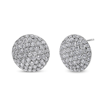 Pair of round white metal stud earrings completely covered with multiple small white gemstones, shown from a slightly angled front view.