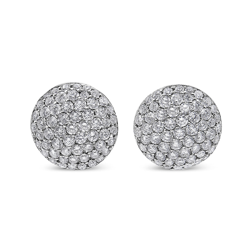 Front view of round white metal earrings fully paved with small white gemstones in shared prong settings.