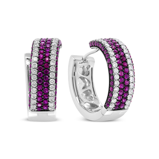 Pair of white metal hoop earrings set with alternating rows of round red and white gemstones, shown in a front and angled view on a white background.