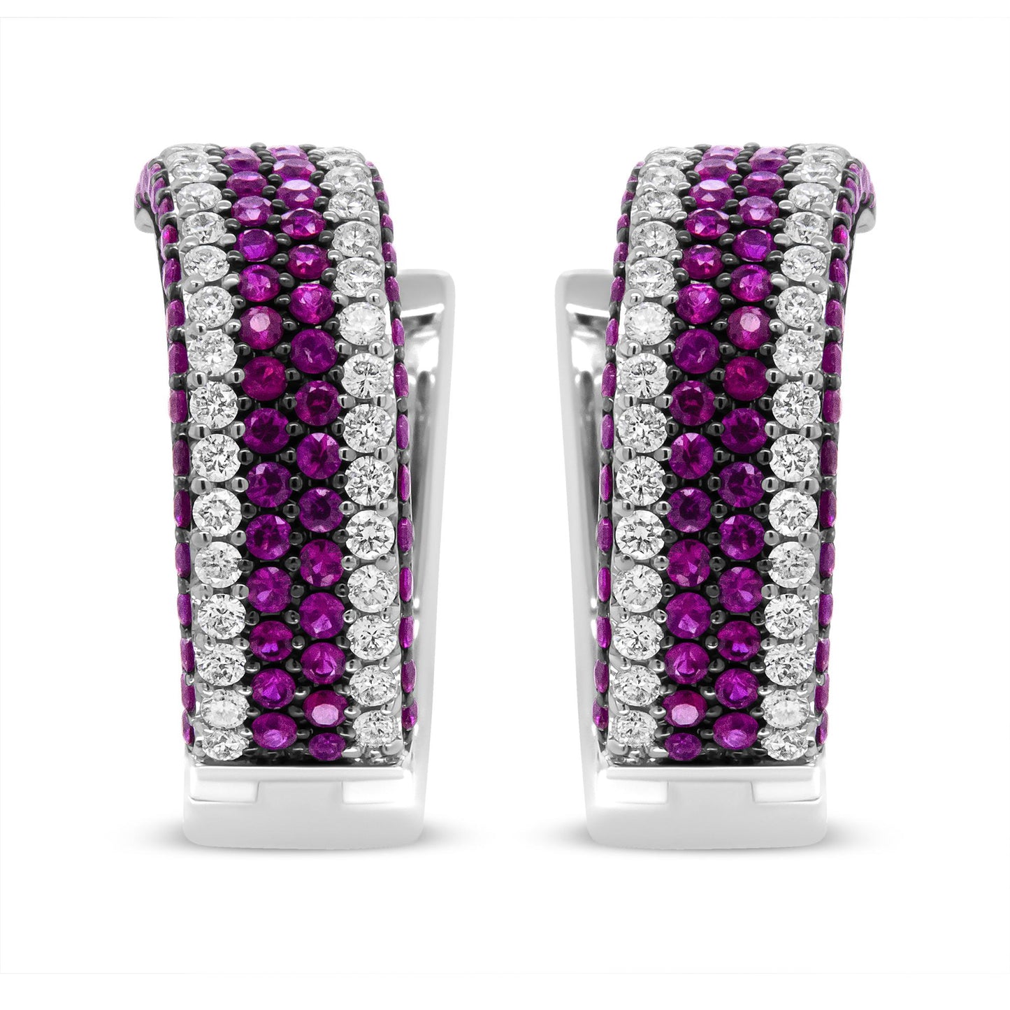 Front view of white metal earrings featuring alternating rows of round red and white gemstones in prong settings.