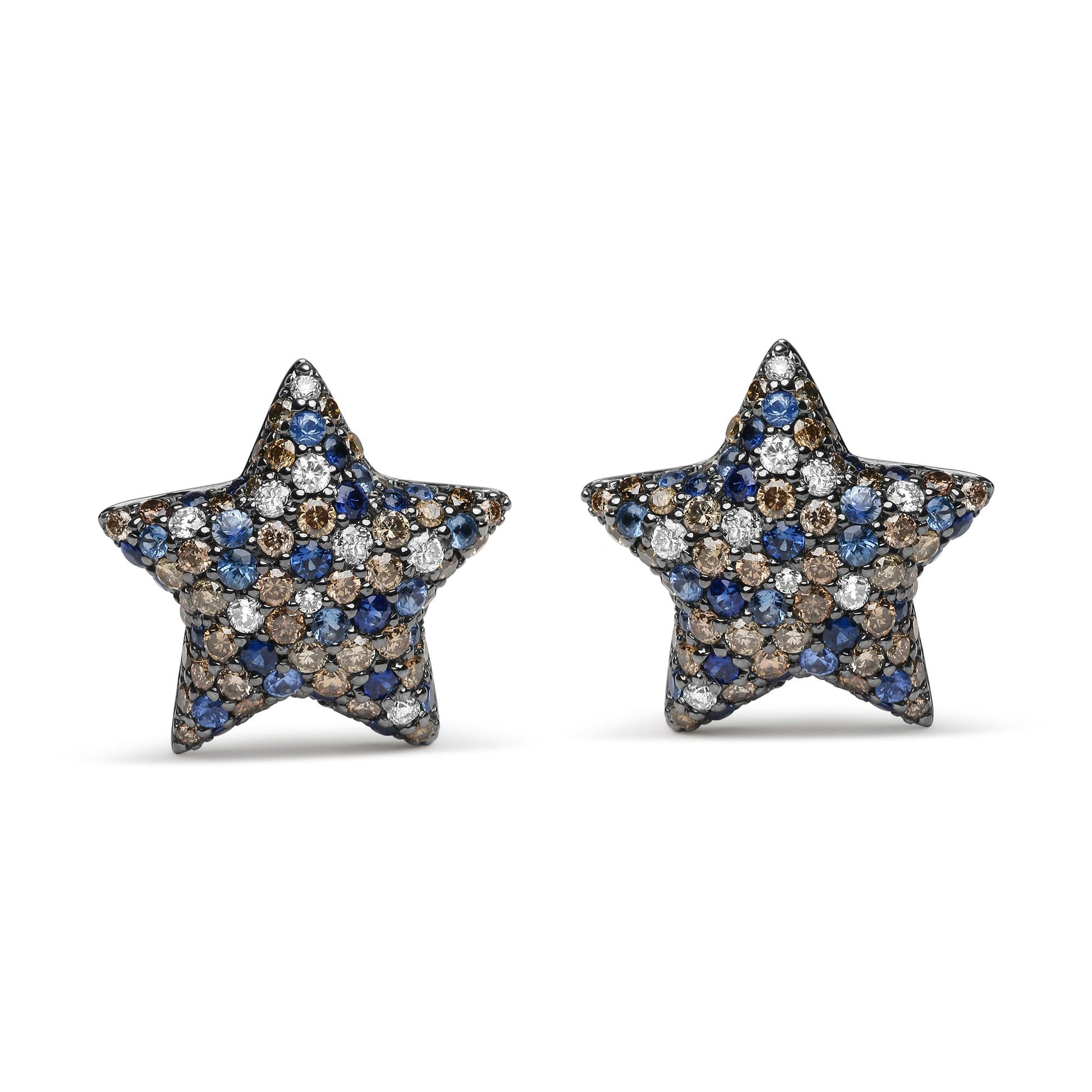 Front-facing shot of star-shaped white metal earrings with pave setting of round red, white, and blue gemstones.