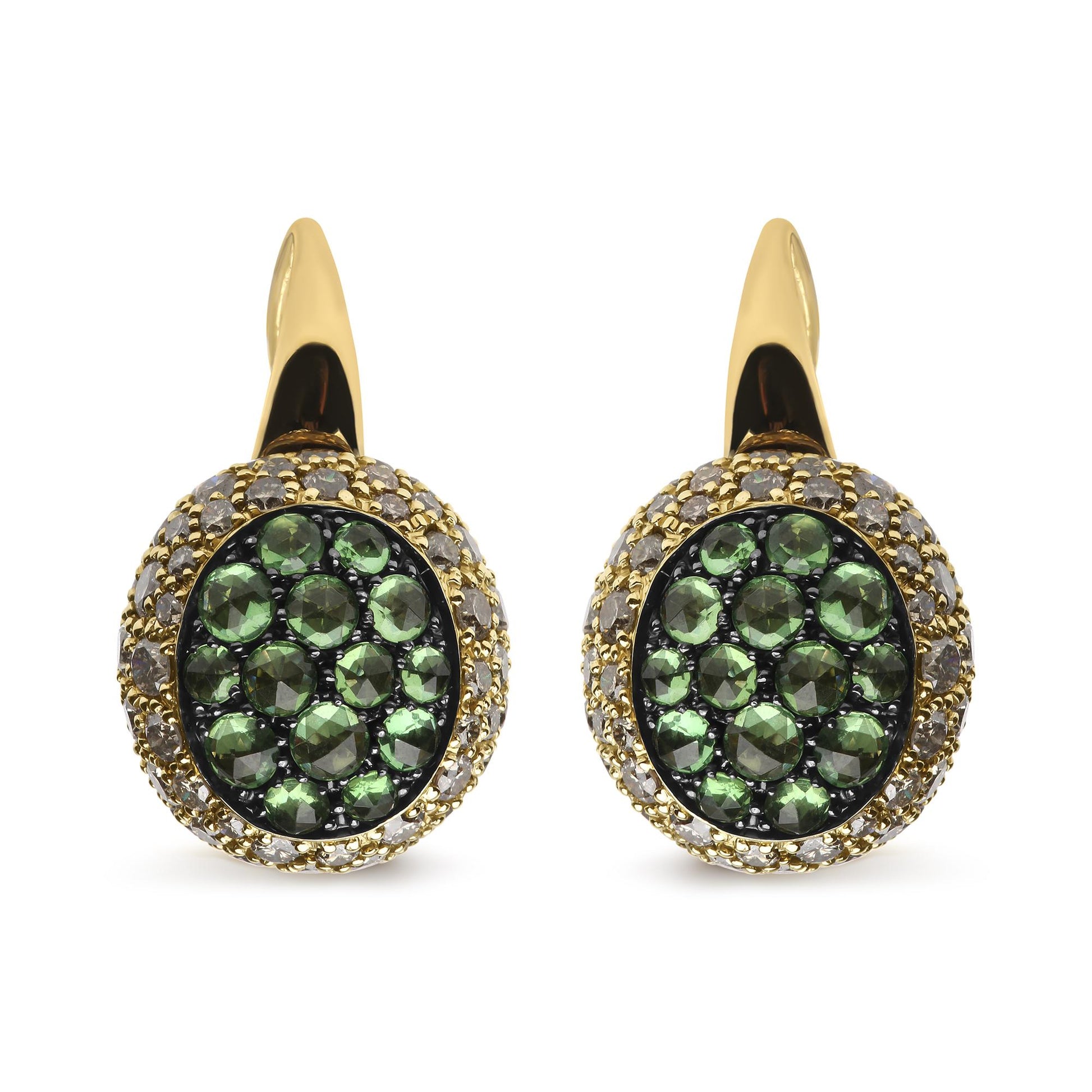 Front-facing close-up of yellow and black metal earrings with round green gemstones in the center and round brown gemstones surrounding them in a pave setting.