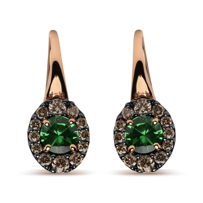Front-facing close-up of a pair of earrings with white and rose metal, each featuring a round green gemstone in the center surrounded by multiple round brown gemstones in prong settings.