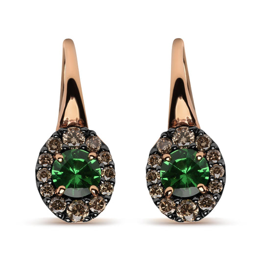 Front-facing close-up of a pair of earrings with white and rose metal, each featuring a round green gemstone in the center surrounded by multiple round brown gemstones in prong settings.