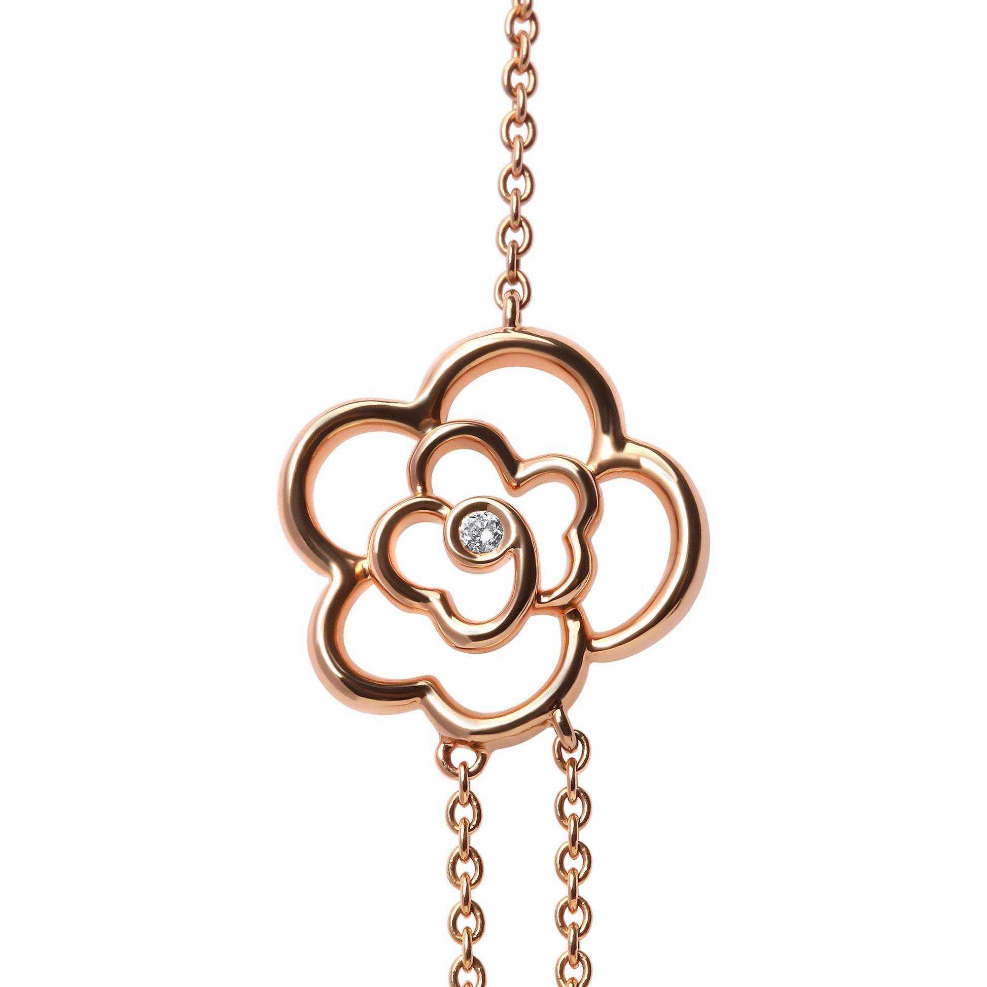 Close-up front view of a rose-colored necklace pendant shaped like an open flower with a round white gemstone in bezel setting at the center, shown against a white background.