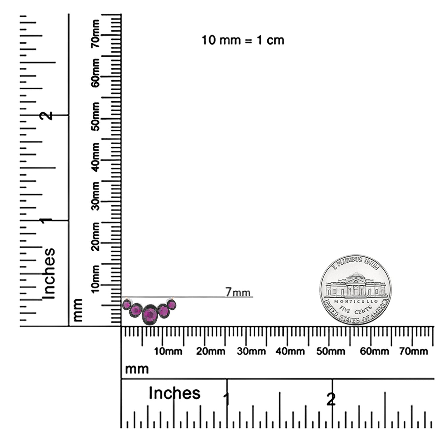 Rose metal necklace with small round red gemstones set in a curved row, shown in a close-up shot on a ruler and scale for size reference.