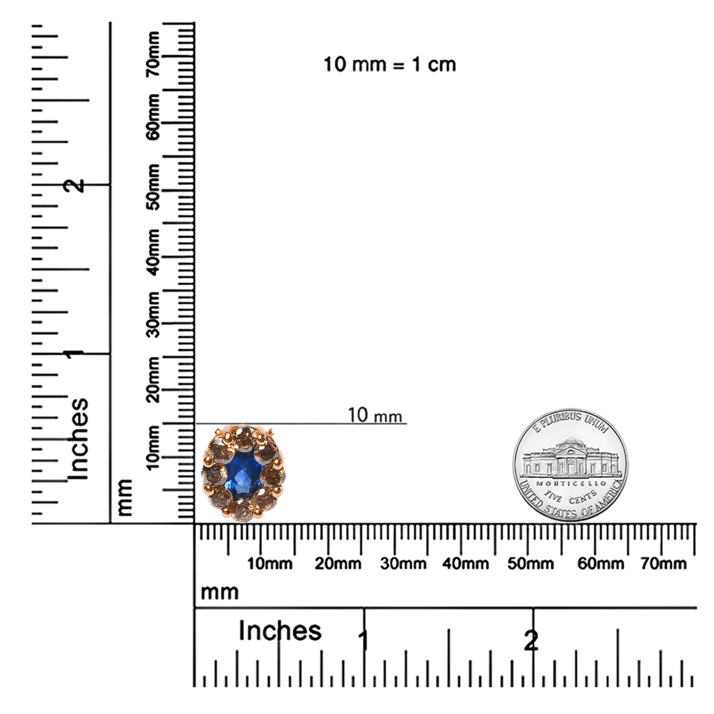 Rose-colored necklace pendant with a central blue oval gemstone surrounded by brown round gemstones in prong settings and two white round gemstones in bezel settings, shown on a ruler and scale for size reference, top-down angle.
