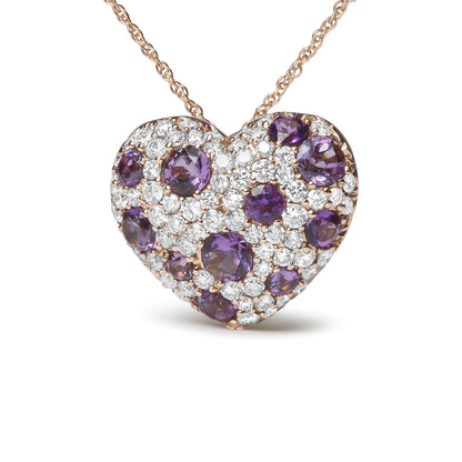 Front-facing shot of a heart-shaped rose metal necklace pendant adorned with round purple gemstones and white gemstones in prong settings, connected to a delicate rose-colored chain.