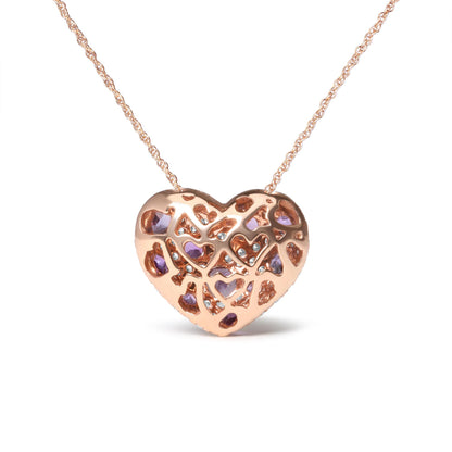 Front angle view of a rose metal heart-shaped necklace pendant featuring a lattice design with embedded white and purple round gemstones in prong settings.