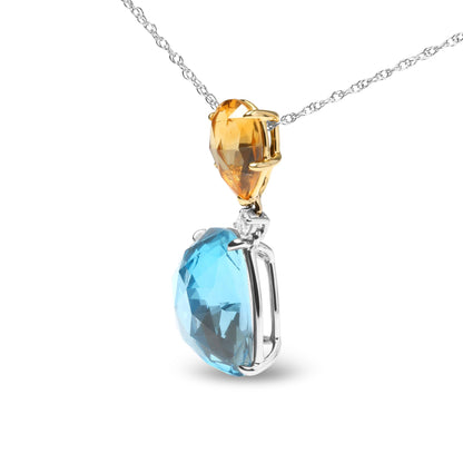 Close-up side angle of a two-tone necklace pendant featuring a yellow pear-shaped gemstone set in yellow metal above a large blue cushion-shaped gemstone set in white metal, accented by a small round white gemstone between them.