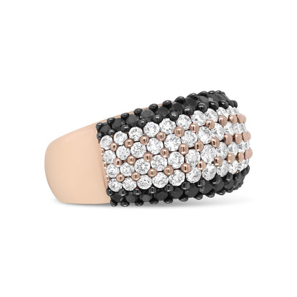 Close-up side view of a rose-colored ring featuring rows of round white and black gemstones in prong settings.