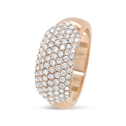Close-up angled view of a rose-colored ring featuring a domed cluster of round white gemstones in pave setting.