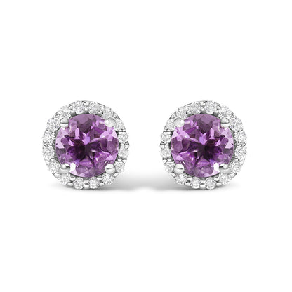 Pair of round purple gemstone stud earrings surrounded by small white gemstones in shared prong settings, shown in a front-facing close-up view on a white background.