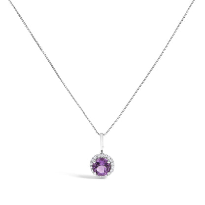 White metal necklace set with a round purple gemstone pendant surrounded by round white gemstones, shown against a white background from a front angle.