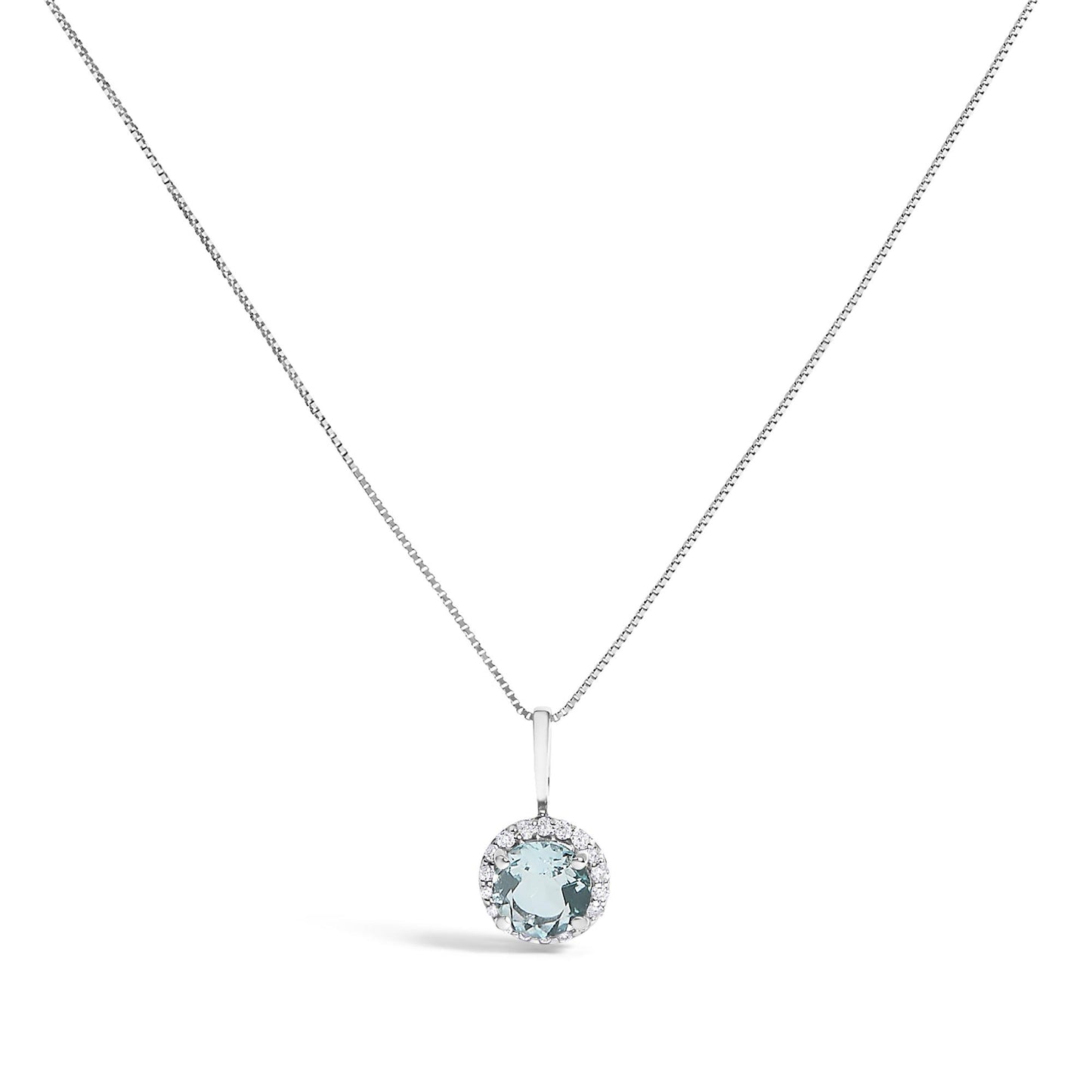 Close-up front view of a white metal necklace pendant set with a round blue gemstone surrounded by a halo of small round white gemstones.