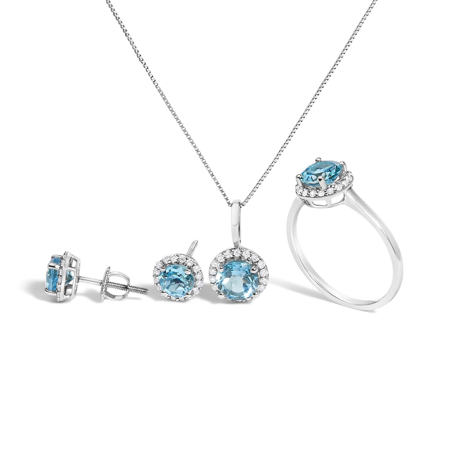 Set of white jewelry including a ring, a pendant necklace, and a pair of stud earrings, each featuring a round blue gemstone surrounded by small round white gemstones, shown from a front angle on a white background.