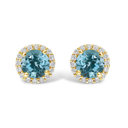 Pair of round blue gemstone stud earrings surrounded by small white gemstones in a shared prong setting, shown at a front angle on a white background.