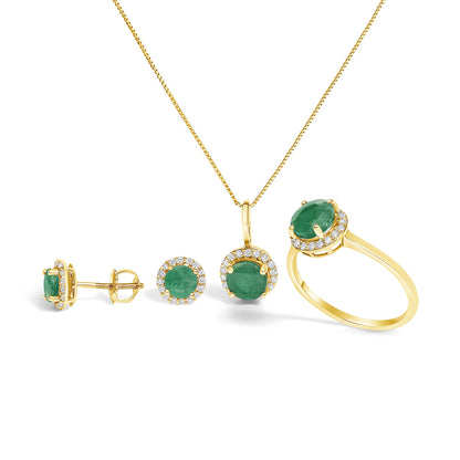 Set of jewelry shown on a white background from a front angle, featuring a necklace with a pendant, a ring, and a pair of stud earrings. Each piece has a central round green gemstone surrounded by smaller white gemstones in a shared prong setting, all set in yellow-colored metal.