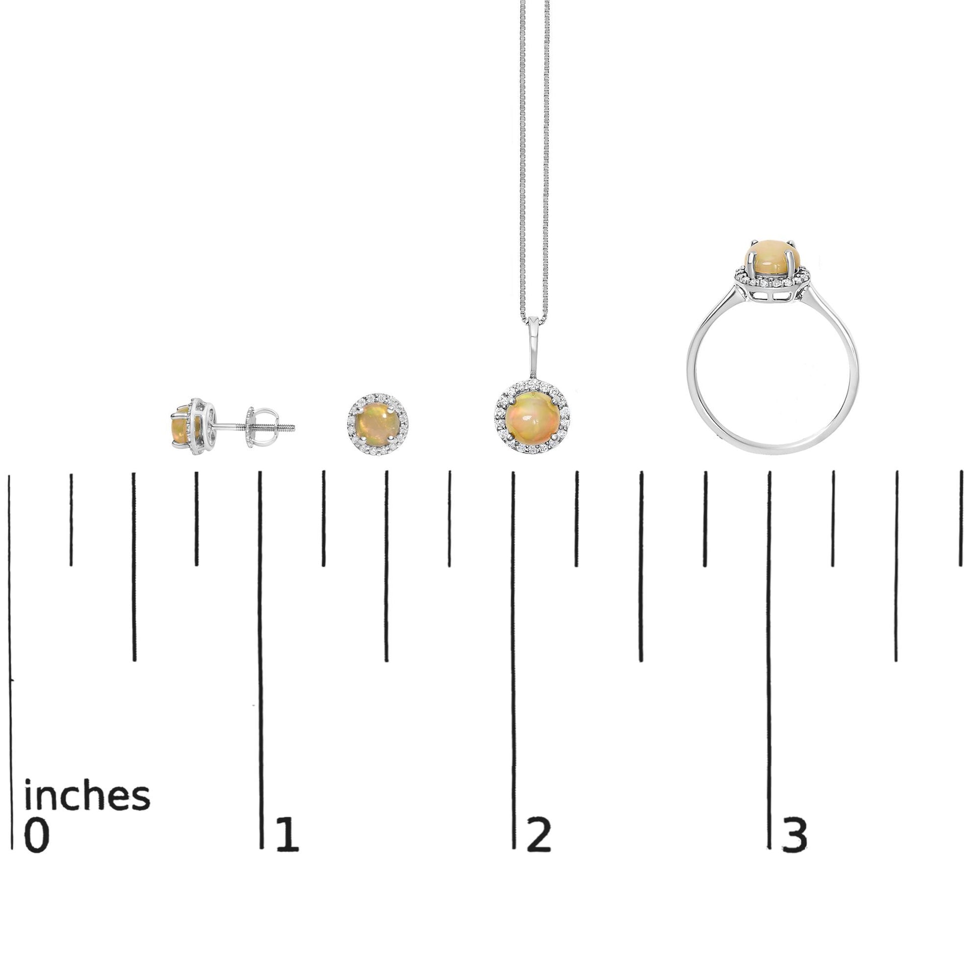 Jewelry set displayed on a white surface and shown on a scale, featuring round multi-color opal gemstones with surrounding round white gemstones set in white metal, including stud earrings, a pendant on a chain, and a ring, shot from the front with side and top angles.