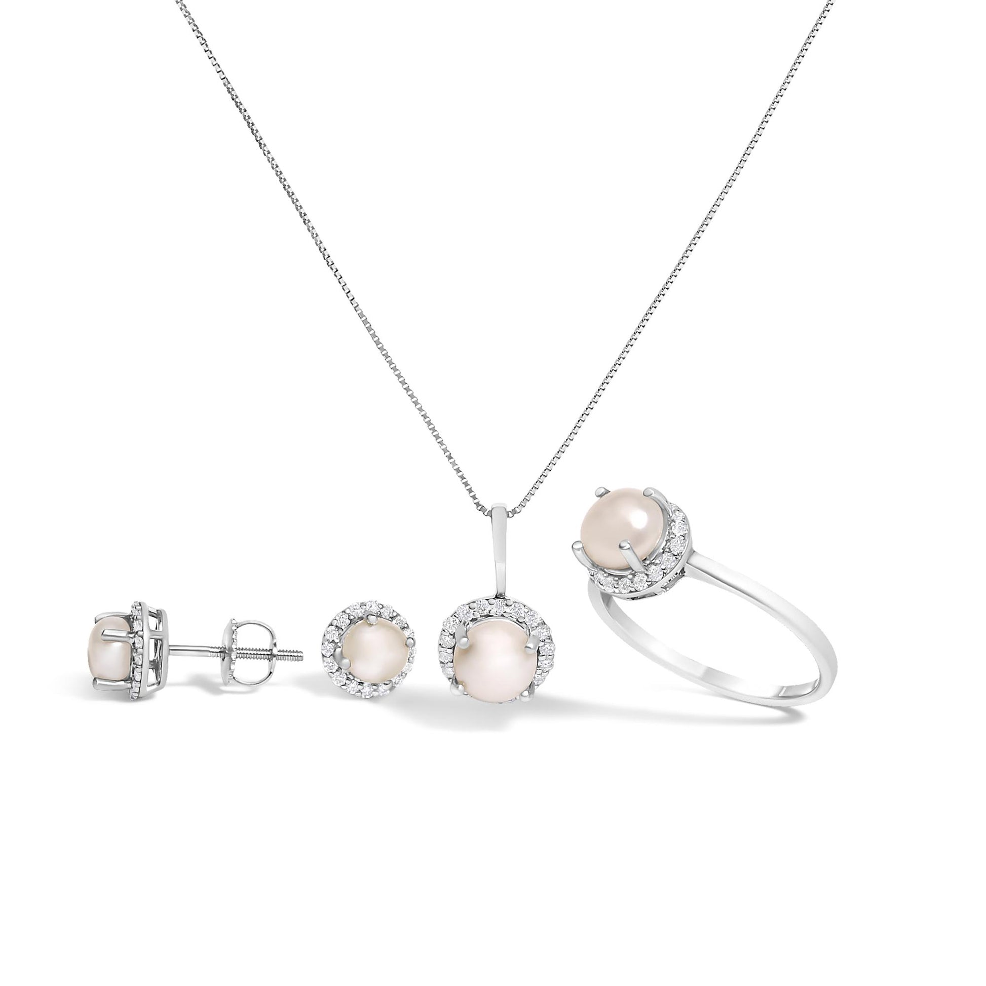 Set of white metal jewelry including a ring, a pendant necklace, and a pair of stud earrings, each featuring a central round light pink gemstone surrounded by a halo of small white gemstones, shown from a front and side angle on a white background.