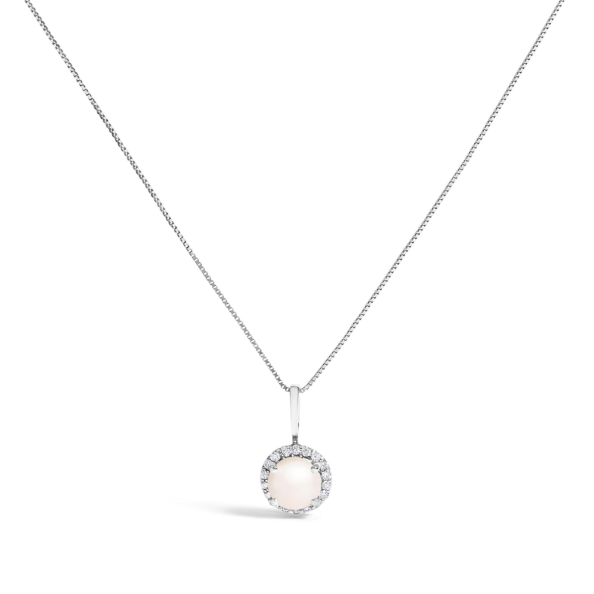 White metal necklace with round-shaped pendant featuring a central translucent gemstone surrounded by white gemstones in shared prong setting, shown in a front-facing angle on white background.