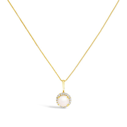 Front view of a yellow metal necklace pendant set with a central round white gemstone surrounded by smaller white gemstones in a shared prong setting.