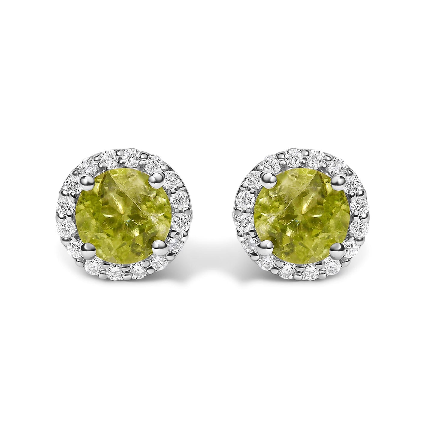 Close-up front view of a pair of round stud earrings with green round gemstones surrounded by a halo of small white round gemstones in shared prong settings.